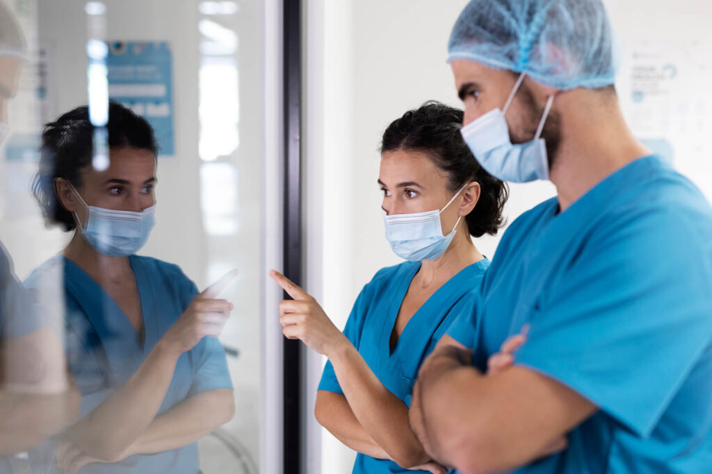 nurses-wearing-face-masks-side-view